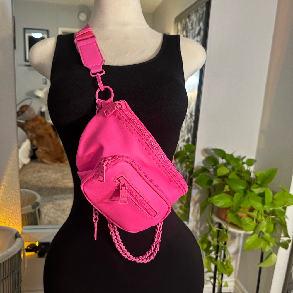 Hot pink belt bag or crossbody.